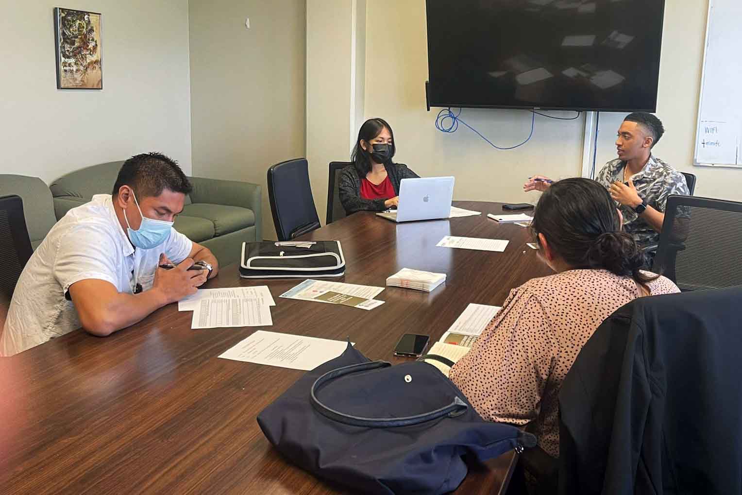 Photo of team at a table