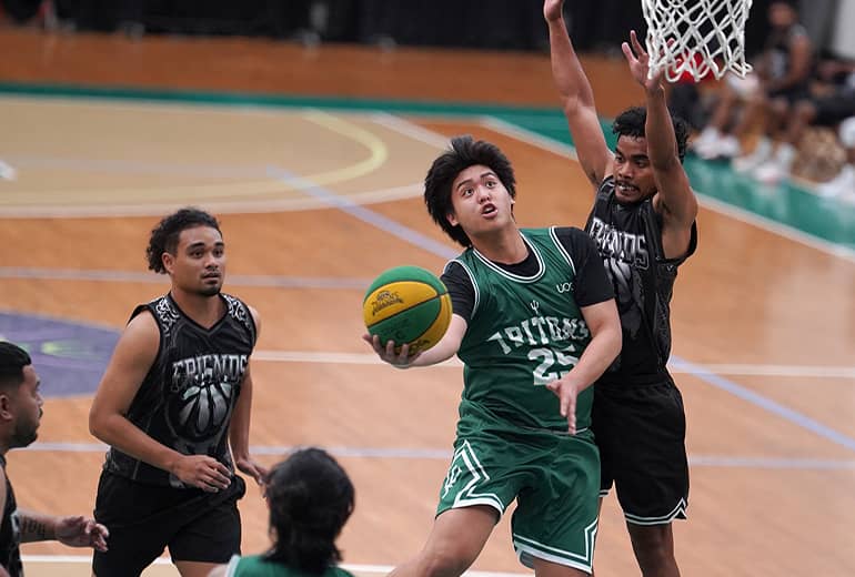 #25 basketball player jumps to make shot while opponent tries to block