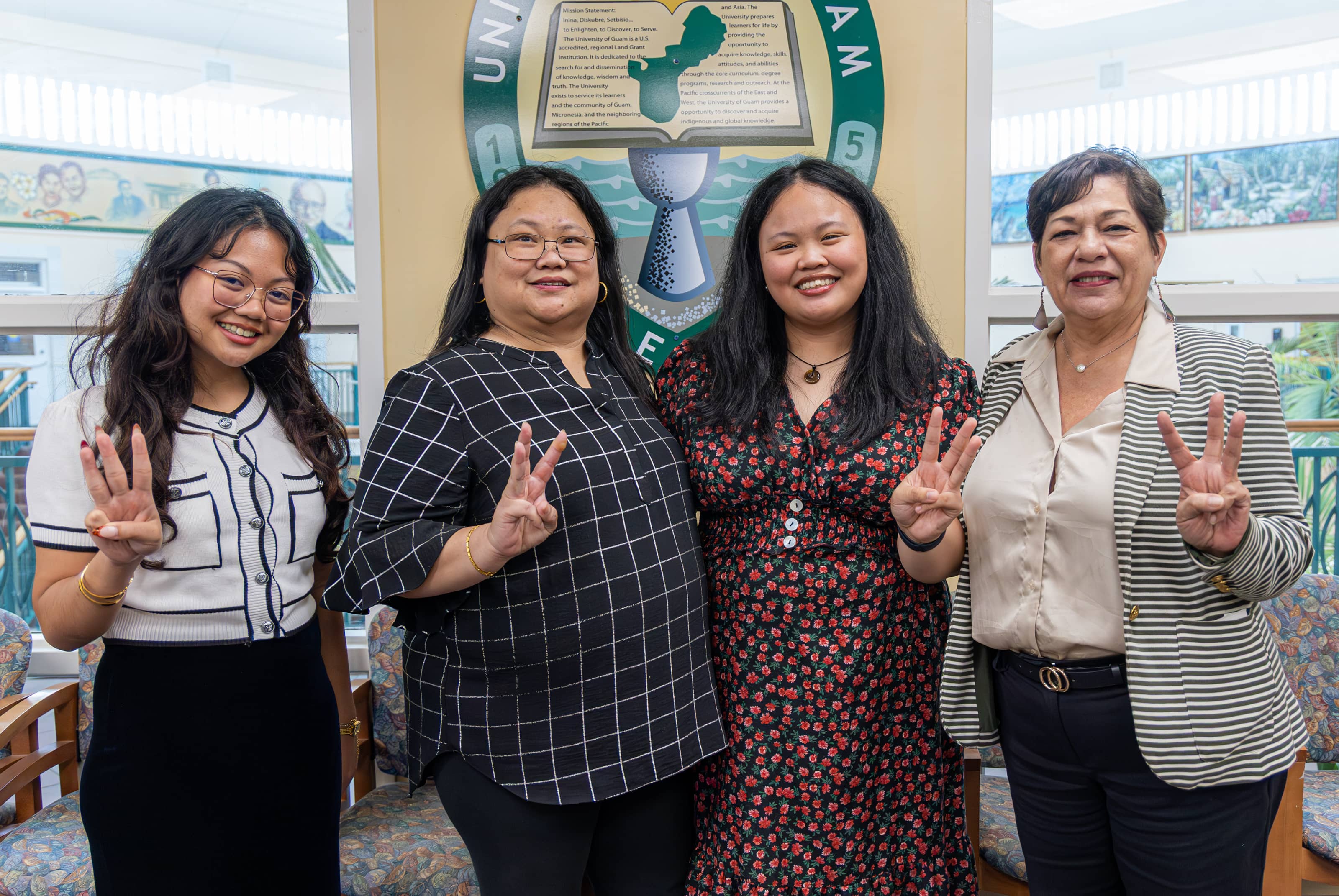 From left to right: 2024 Truman Scholar and UOG Student Regent Julie Ann Laxamana, proud mother Maricris Dela Cruz, 2025 Truman Scholar Grace Anne Dela Cruz, and Interim Dean of Enrollment Management and Student Success Gena Rojas celebrate Grace Anne’s selection as UOG’s 22nd Truman Scholar — and the first from its Nursing program.